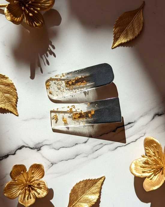 Σετ δυο hair clips μαύρα με φύλλα χρ΄υσου